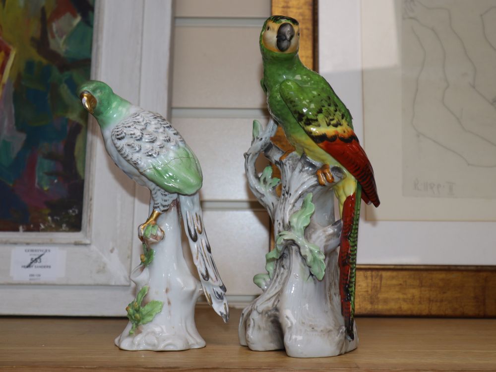 A Continental porcelain figure of a parrot and a German porcelain parrot, tallest